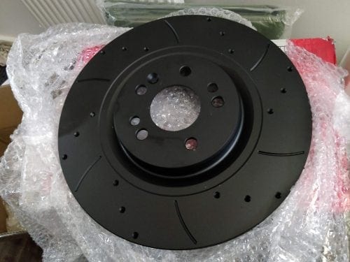 Mtec ML500 V8 brake disc: black coated, drilled and grooved.
